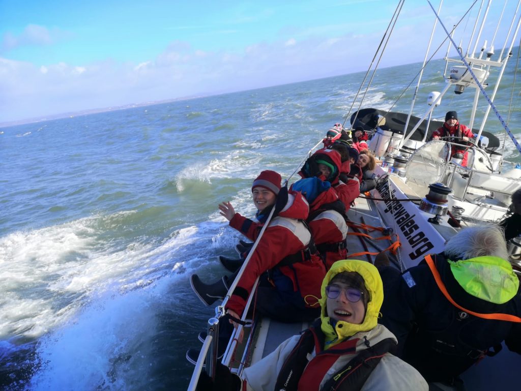 College students sailing on Challenge Wales